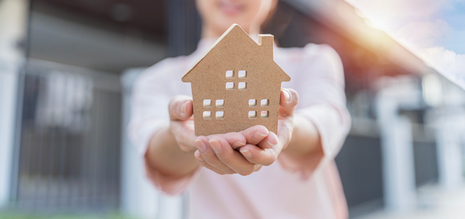 Hands Holding Wooden House Model, Family Home, Homeless Shelter